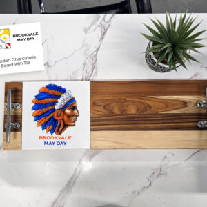6.5” x 25” wooden board with two steel handles with a 6”x 6” tile insert